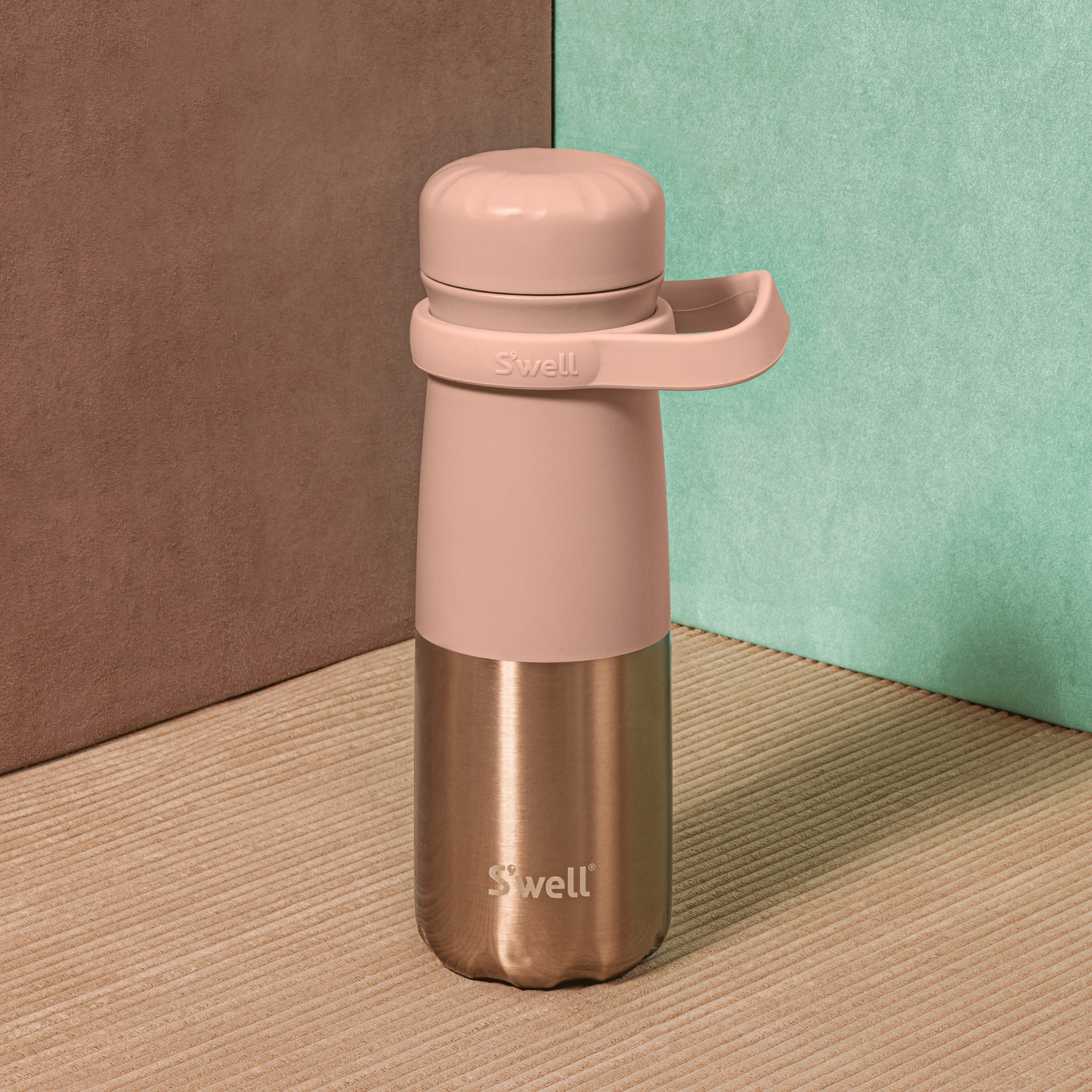 http://www.swell.com/cdn/shop/files/Swell-Water-Bottle-Traveler-24oz-Pink-Pyrite-Lifestyle.png?v=1704050490